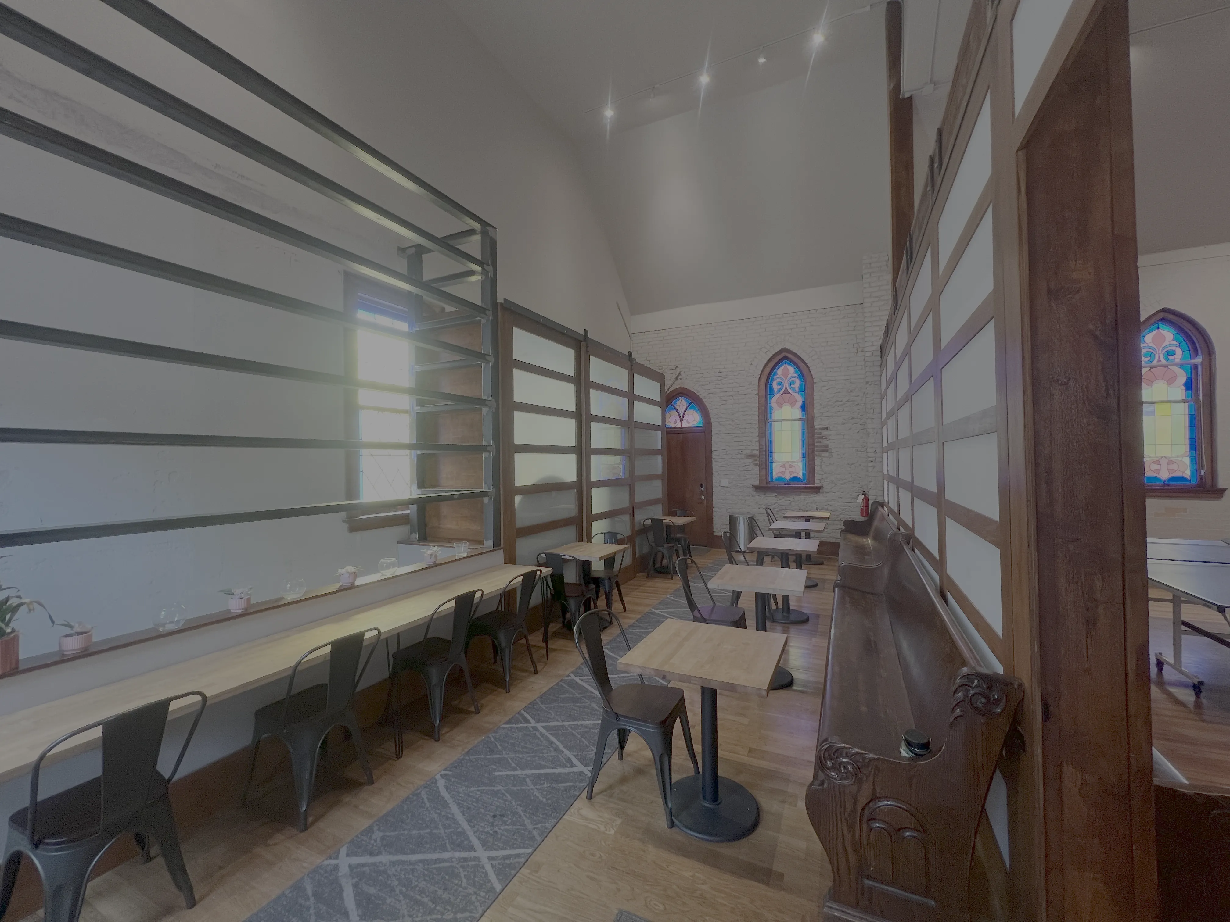 The cafe inside the restored 1905 flex space at Merritt Workspace, where café members work, in Sloan's Lake, Denver